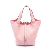 Pre-owned Leather handbags Hermès Vintage , Pink , Dames