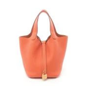 Pre-owned Leather handbags Hermès Vintage , Orange , Dames