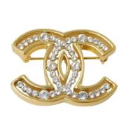 Pre-owned Metal brooches Chanel Vintage , Yellow , Dames