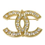 Pre-owned Metal brooches Chanel Vintage , Yellow , Dames