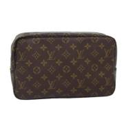 Pre-owned Canvas clutches Louis Vuitton Vintage , Brown , Dames