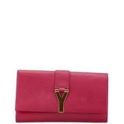 Pre-owned Leather clutches Yves Saint Laurent Vintage , Pink , Dames