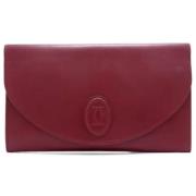 Pre-owned Leather clutches Cartier Vintage , Red , Dames