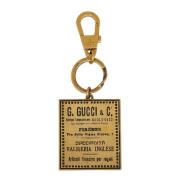 Pre-owned Metal key-holders Gucci Vintage , Yellow , Dames