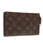 Pre-owned Canvas pouches Louis Vuitton Vintage , Brown , Dames