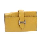 Pre-owned Leather wallets Hermès Vintage , Yellow , Dames