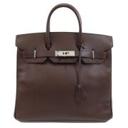 Pre-owned Leather handbags Hermès Vintage , Brown , Dames