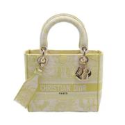 Pre-owned Canvas handbags Dior Vintage , Yellow , Dames