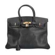 Pre-owned Leather handbags Hermès Vintage , Black , Dames