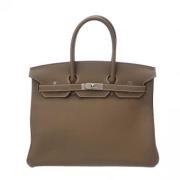 Pre-owned Leather handbags Hermès Vintage , Gray , Dames