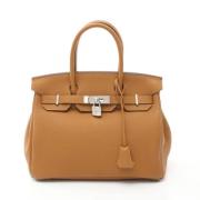 Pre-owned Leather handbags Hermès Vintage , Brown , Dames