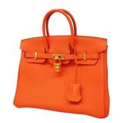 Pre-owned Leather handbags Hermès Vintage , Orange , Dames