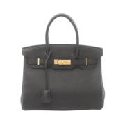 Pre-owned Leather handbags Hermès Vintage , Black , Dames