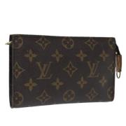 Pre-owned Canvas pouches Louis Vuitton Vintage , Brown , Dames