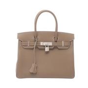 Pre-owned Leather handbags Hermès Vintage , Brown , Dames