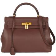 Pre-owned Leather handbags Hermès Vintage , Brown , Dames