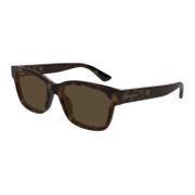 Stijlvolle zonnebril met zwarte montuur Gucci , Brown , Unisex