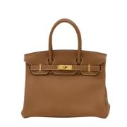 Pre-owned Leather handbags Hermès Vintage , Brown , Dames