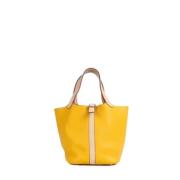 Pre-owned Leather handbags Hermès Vintage , Yellow , Dames