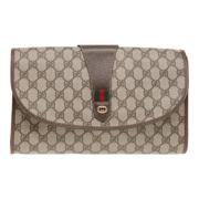 Pre-owned Canvas clutches Gucci Vintage , Beige , Dames