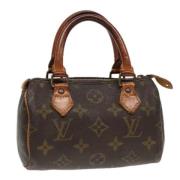 Pre-owned Canvas handbags Louis Vuitton Vintage , Brown , Dames