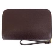 Pre-owned Leather clutches Louis Vuitton Vintage , Red , Dames