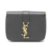 Pre-owned Leather wallets Yves Saint Laurent Vintage , Black , Dames