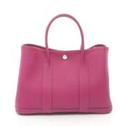 Pre-owned Leather handbags Hermès Vintage , Pink , Dames