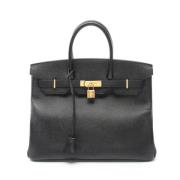 Pre-owned Fabric handbags Hermès Vintage , Black , Dames