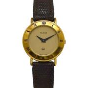 Pre-owned Leather watches Gucci Vintage , Yellow , Dames