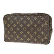 Pre-owned Canvas clutches Louis Vuitton Vintage , Brown , Dames