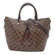 Pre-owned Fabric handbags Louis Vuitton Vintage , Brown , Dames