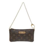 Pre-owned Canvas clutches Louis Vuitton Vintage , Brown , Dames