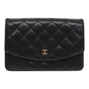 Pre-owned Leather pouches Chanel Vintage , Black , Dames