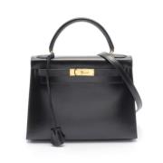 Pre-owned Fabric handbags Hermès Vintage , Black , Dames