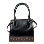 Pre-owned Leather totes Yves Saint Laurent Vintage , Black , Dames