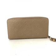 Pre-owned Fabric wallets Louis Vuitton Vintage , Beige , Dames