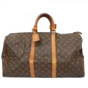 Pre-owned Fabric handbags Louis Vuitton Vintage , Brown , Dames