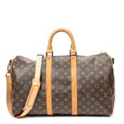 Pre-owned Canvas travel-bags Louis Vuitton Vintage , Brown , Dames