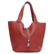 Pre-owned Leather totes Hermès Vintage , Red , Dames