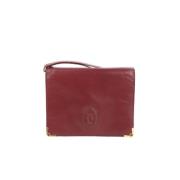 Pre-owned Leather clutches Cartier Vintage , Red , Dames