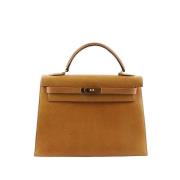 Pre-owned Leather handbags Hermès Vintage , Beige , Dames