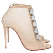 Pre-owned Polyester boots Christian Louboutin Pre-owned , Beige , Dame...