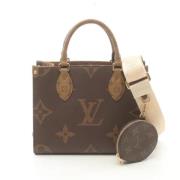 Pre-owned Canvas handbags Louis Vuitton Vintage , Beige , Dames