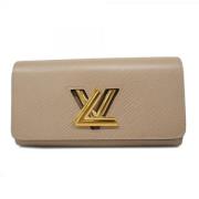 Pre-owned Fabric wallets Louis Vuitton Vintage , Beige , Dames