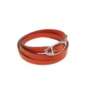 Pre-owned Leather bracelets Hermès Vintage , Orange , Unisex