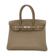 Pre-owned Leather handbags Hermès Vintage , Beige , Dames