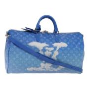 Pre-owned Canvas handbags Louis Vuitton Vintage , Blue , Dames