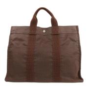 Pre-owned Canvas handbags Hermès Vintage , Brown , Dames