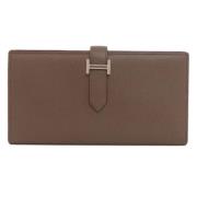 Pre-owned Leather wallets Hermès Vintage , Brown , Dames